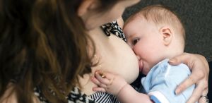 Mother with nursing baby at breastfeeding support group, Cooley Dickinson Hospital, 30 Locust Street, Northampton, MA 01060.