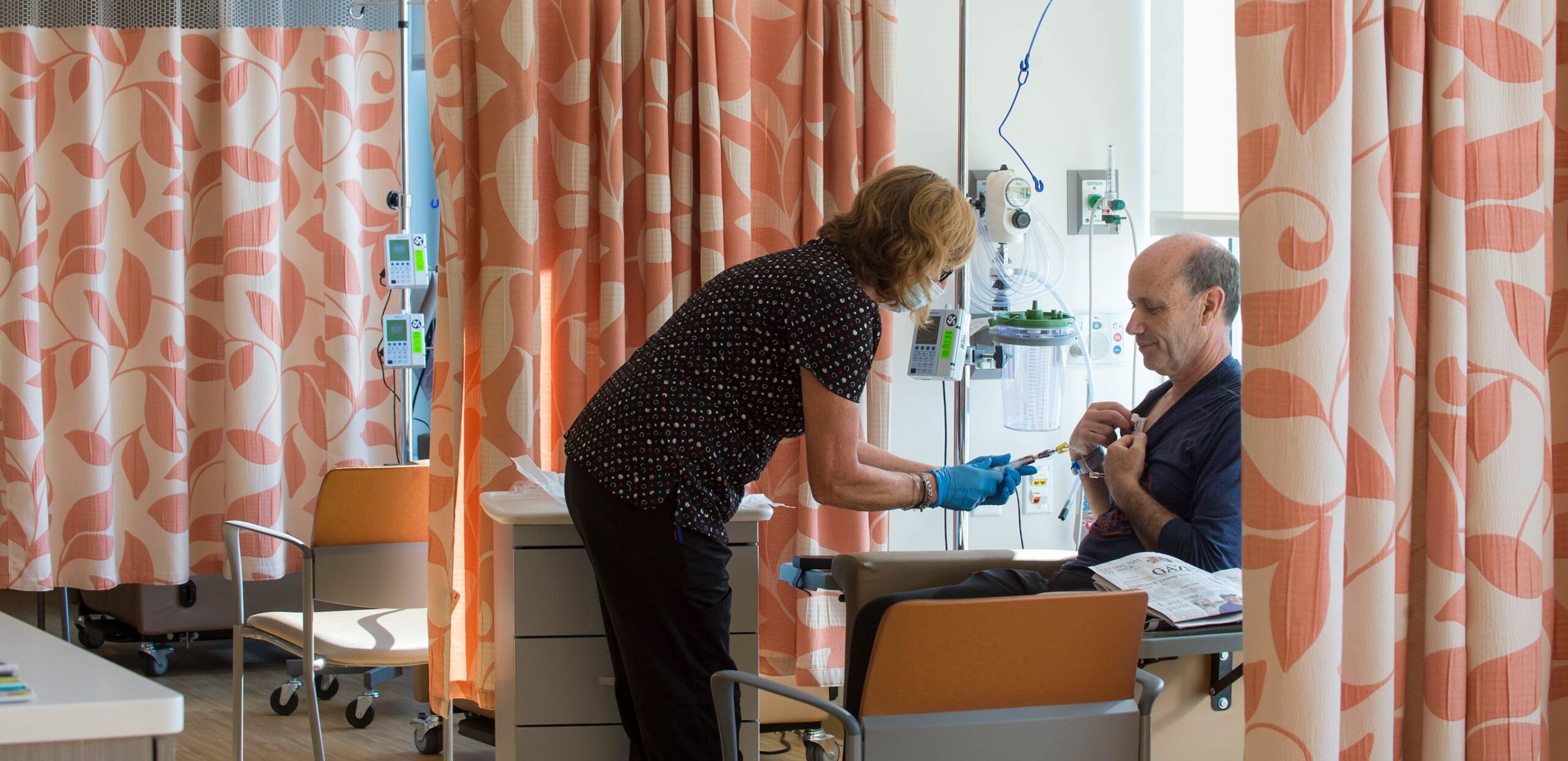 Nurse treating patient: Mass General Cancer Center at Cooley Dickinson Hospital