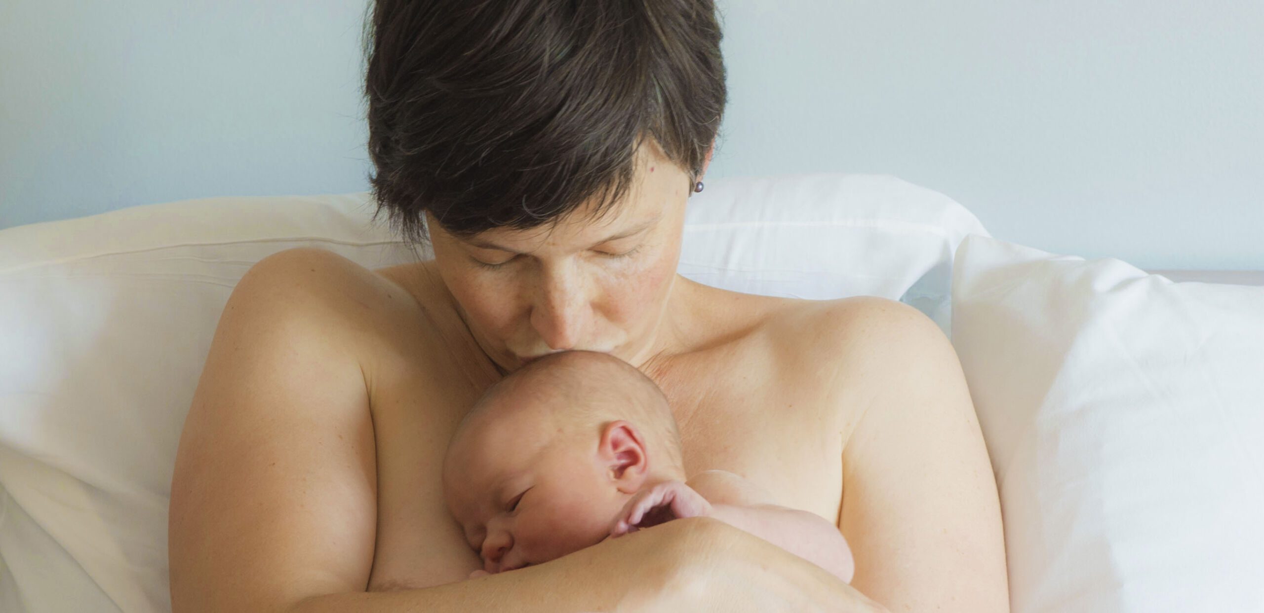 New mother with baby in a patient room at the Cooley Dickinson Hospital Childbirth Center, 30 Locust Street, Northampton, MA 01060.