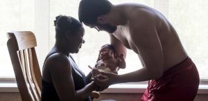 Couple with newborn baby at the Cooley Dickinson Hospital Childbirth Center, 30 Locust Street, Northampton, MA 01060.