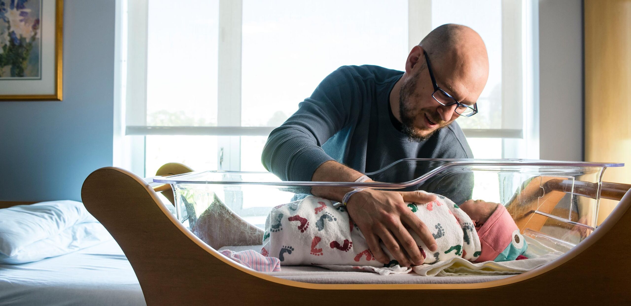 Father with newborn in a patient room at the Cooley Dickinson Hospital Childbirth Center, 30 Locust Street, Northampton, MA 01060.