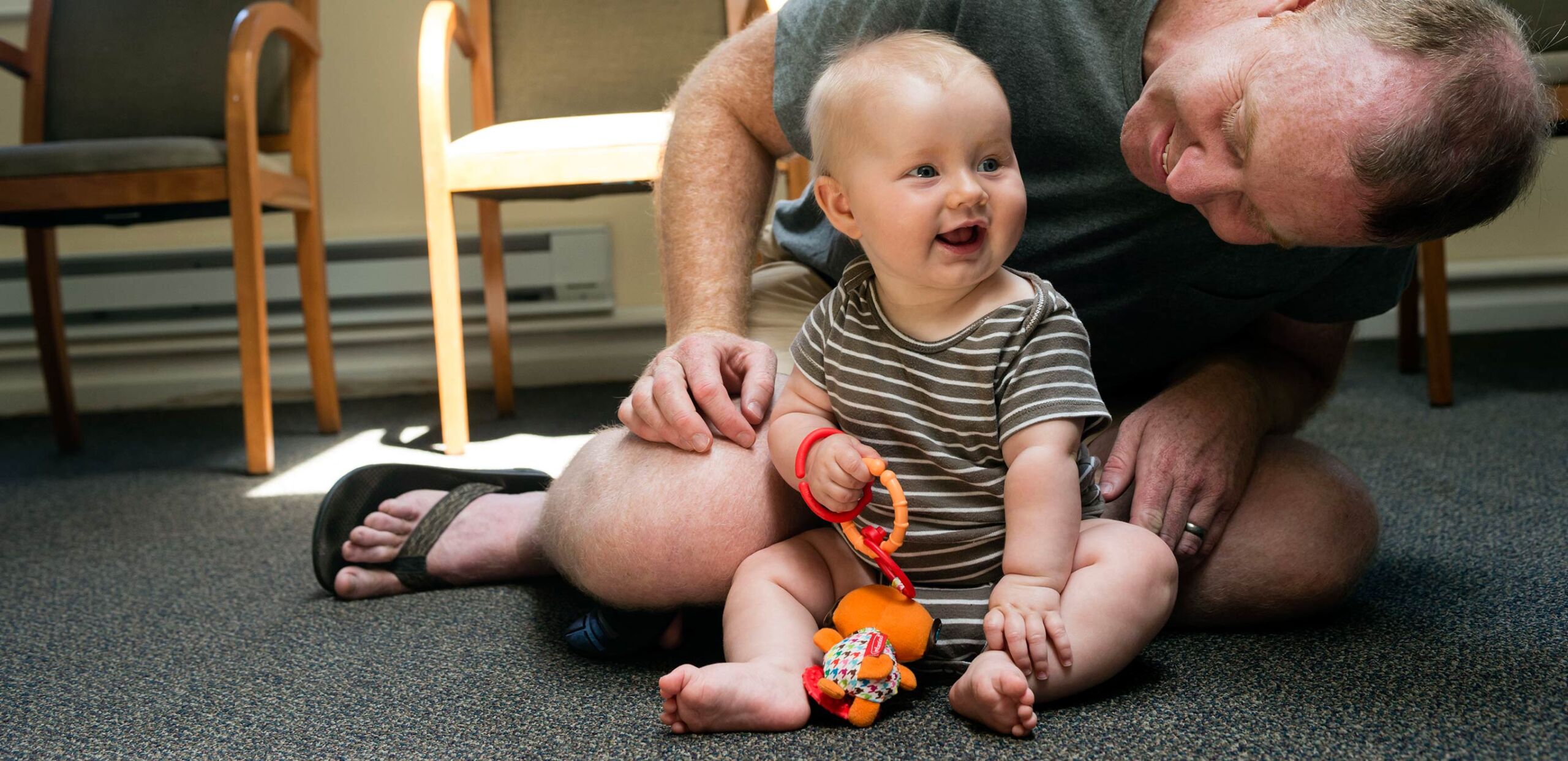 Father plays with baby at a parent support group meeting at Cooley Dickinson Hospital, 30 Locust Street, Northampton, MA 01060.