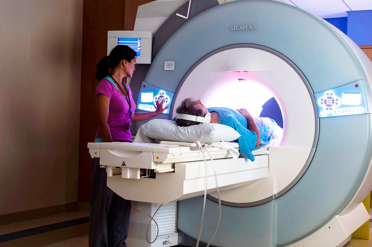 Technologist prepares patient for MRI (Magnetic Resonance Imaging) scan at Cooley Dickinson Hospital, 30 Locust Street, Northampton, MA 01060.