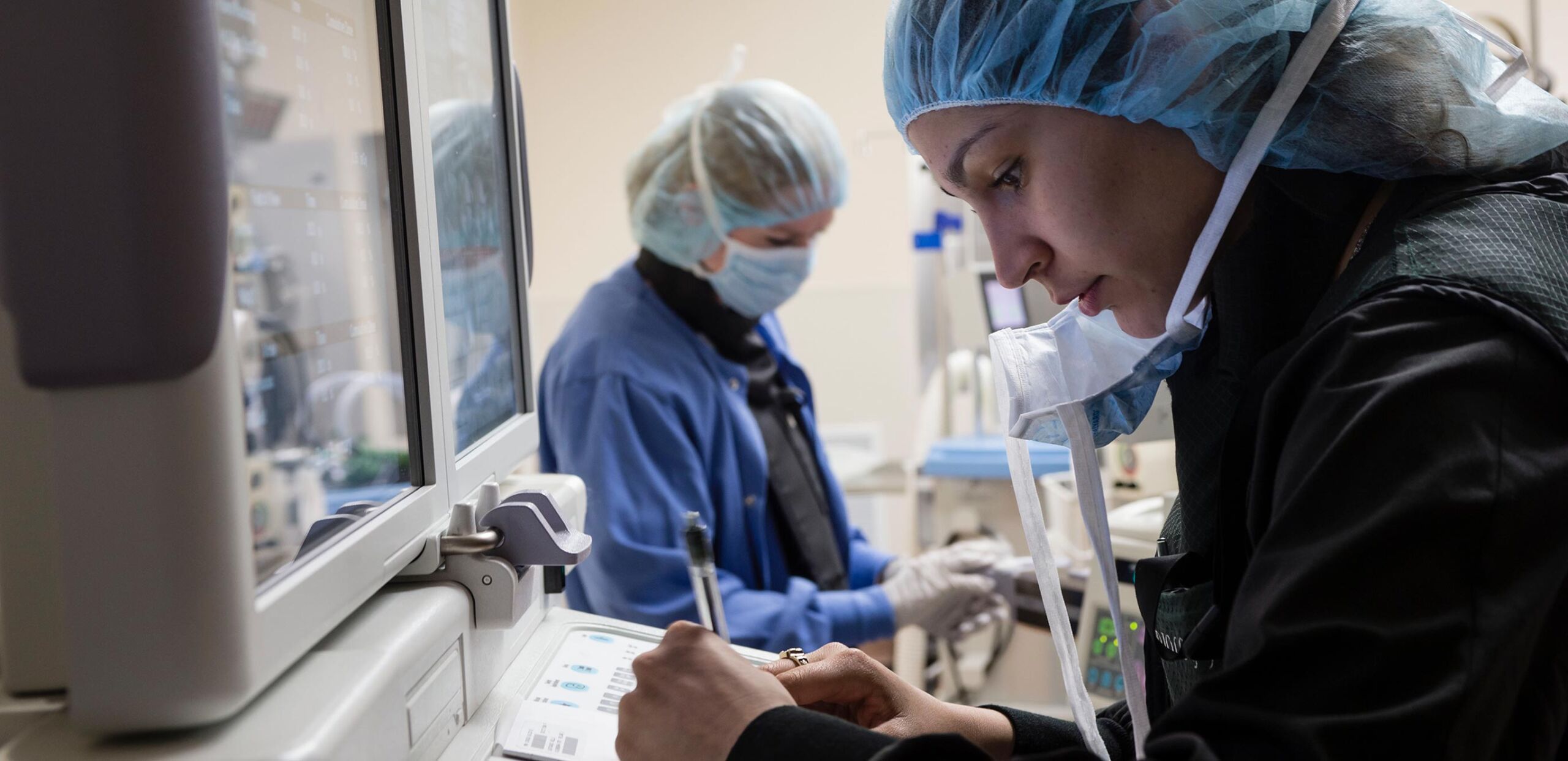 Female health care providers on the job, Cooley Dickinson Health Care System, Northampton, MA 01060.