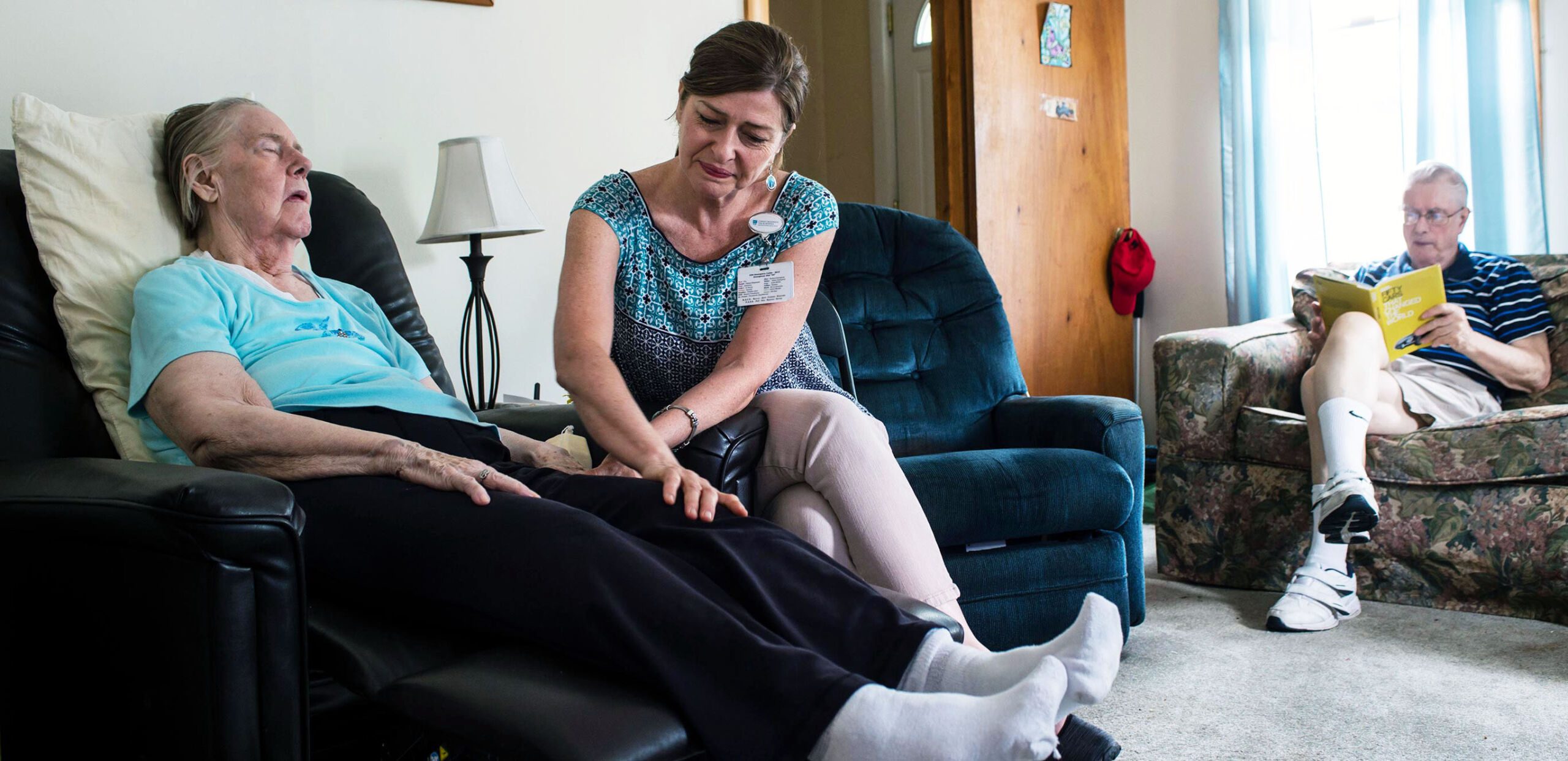 Visiting nurse works with elderly patient in her home, Cooley Dickinson VNA & Hospice, Northampton, MA 01060.