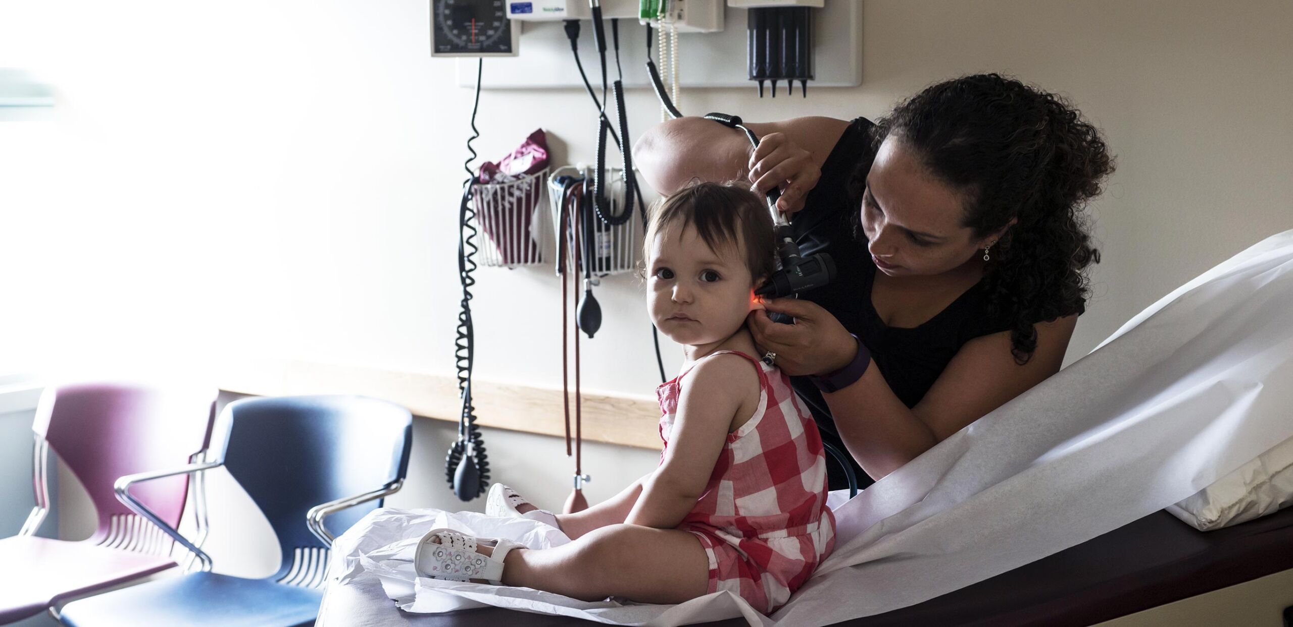 Dr. Yarima Santiago examines a young patient at Cooley Dickinson Medical Group Amherst Medical Associates, Amherst, MA 01002.