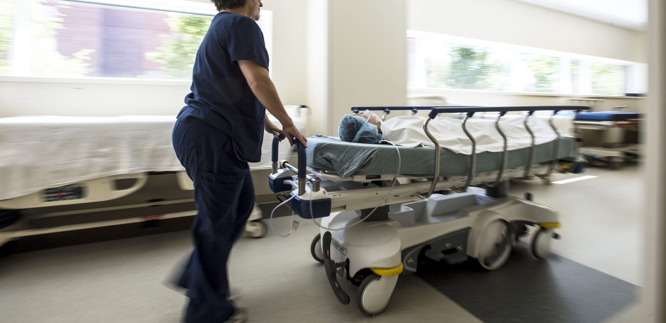 Nurse rushes patient on gurney through corridor at the Emergency Department, Cooley Dickinson Hospital, 30 Locust Street, Northampton, MA 01060.