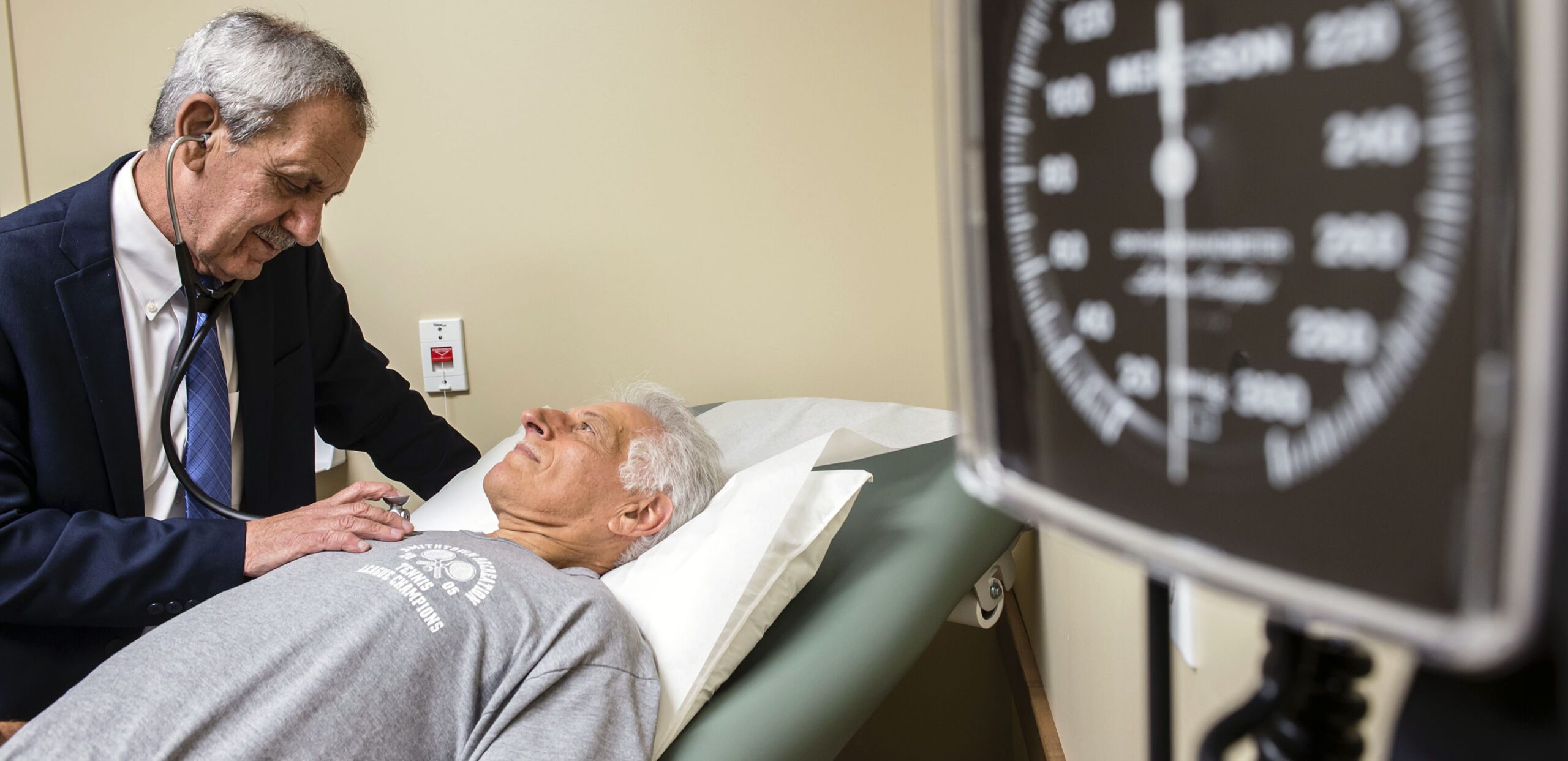 Cardiologist Mark Porway, MD, examines a patient, Hampshire Cardiovascular Associates, Northampton, MA 01060