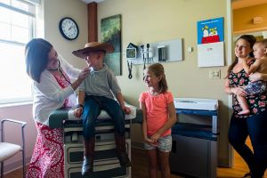 Pediatrician Gina O'Brien with patients at a recent open house at Sugarloaf Pediatrics, South Deerfield