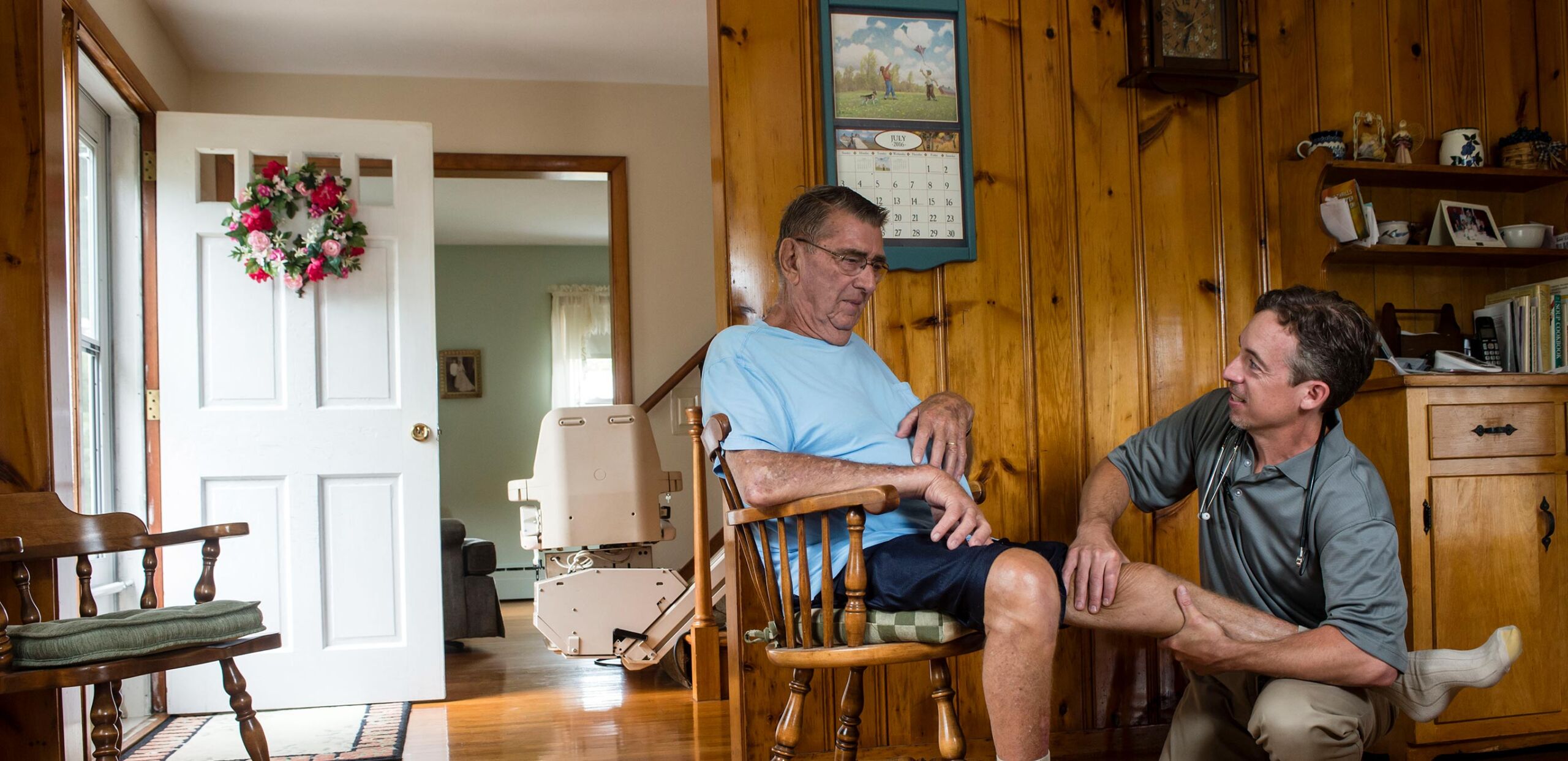 Physical therapist works with patient in his home, Cooley Dickinson Medical Group VNA and Hospice, Northampton, MA 01060.