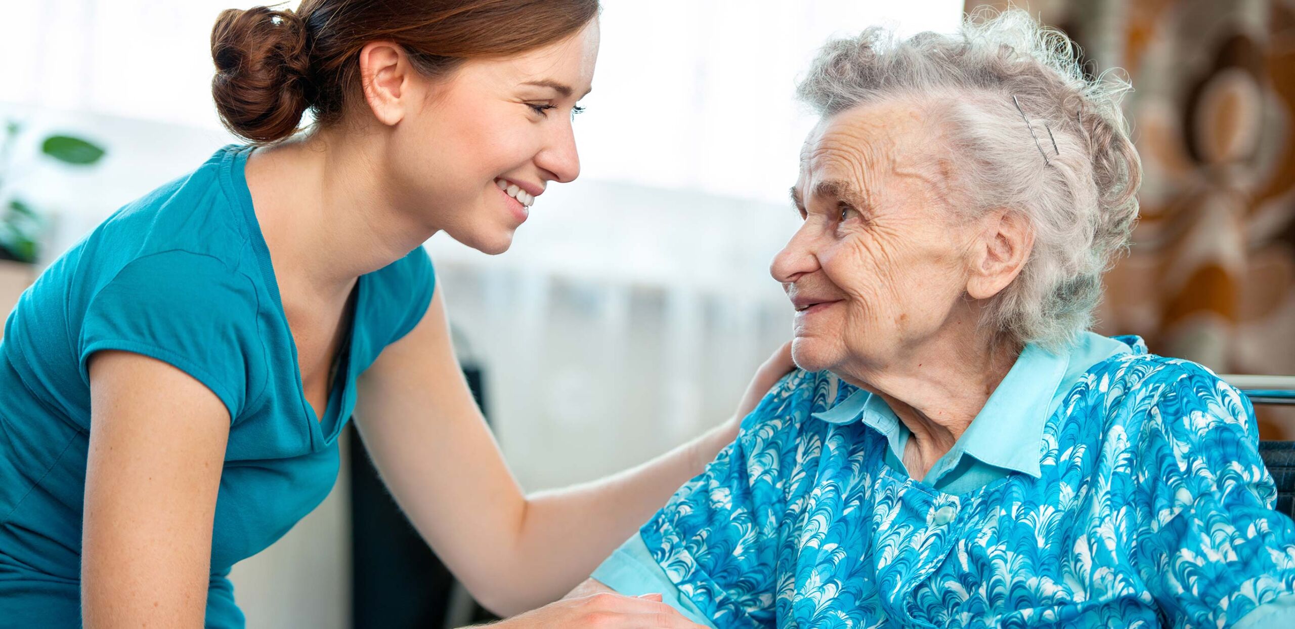 Female social worker talks with elderly female client in her home, Cooley Dickinson Medical Group VNA & Hospice, Northampton, MA 01060.