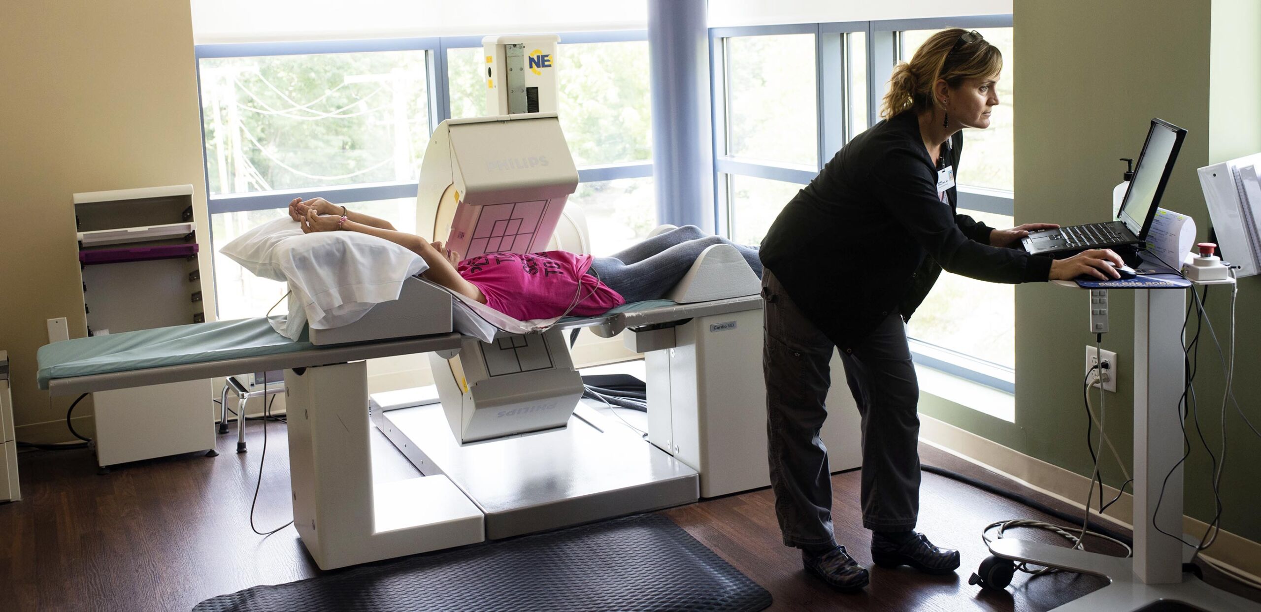 Nuclear Medicine Technologist Brooke Moore monitors a patient during a procedure at Hampshire Cardiovascular Associates, Northampton, MA 01060.