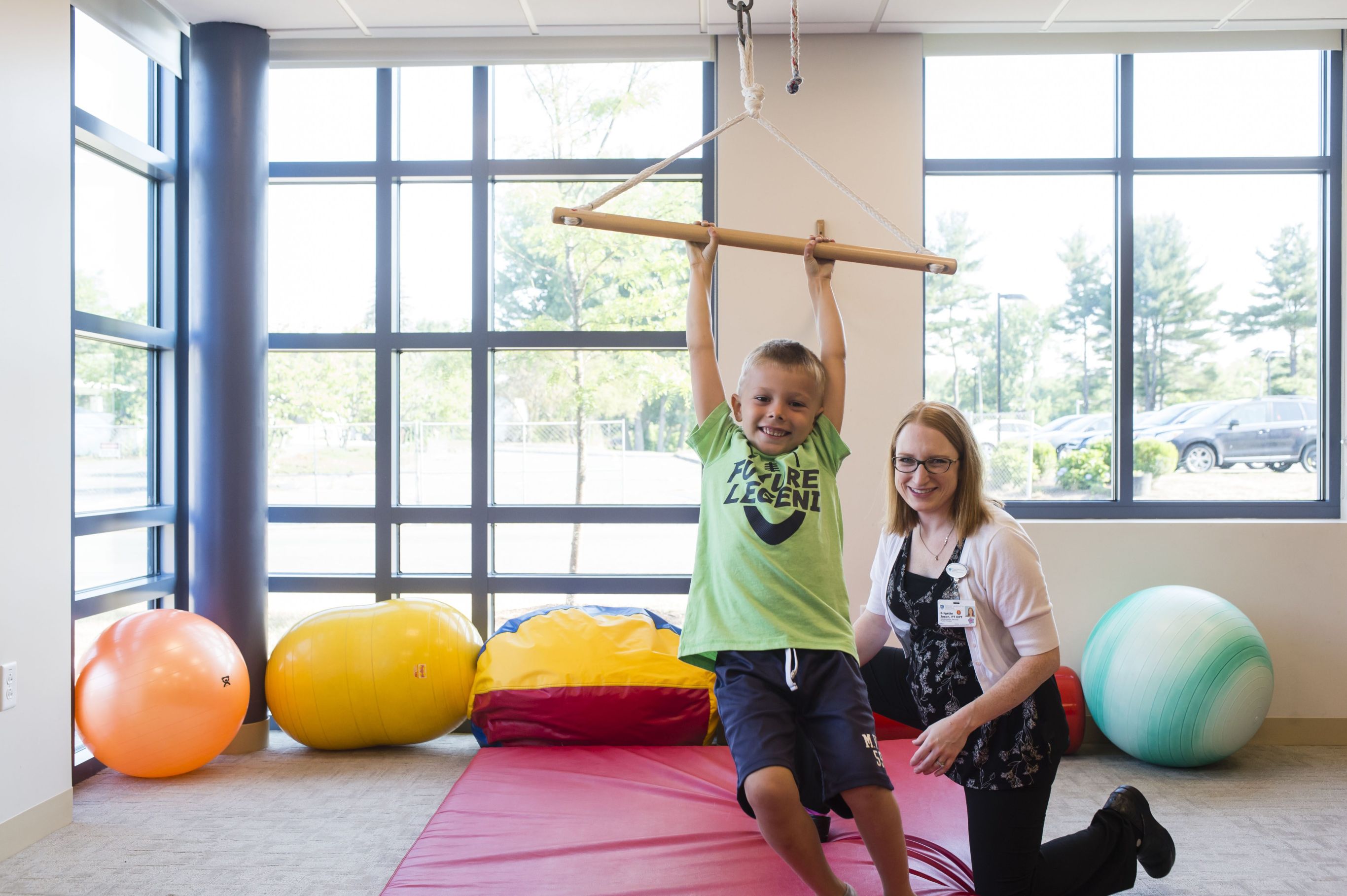 Physical therapist works with young patient at Cooley Dickinson Rehabilitation Services, Northampton, MA 01060.
