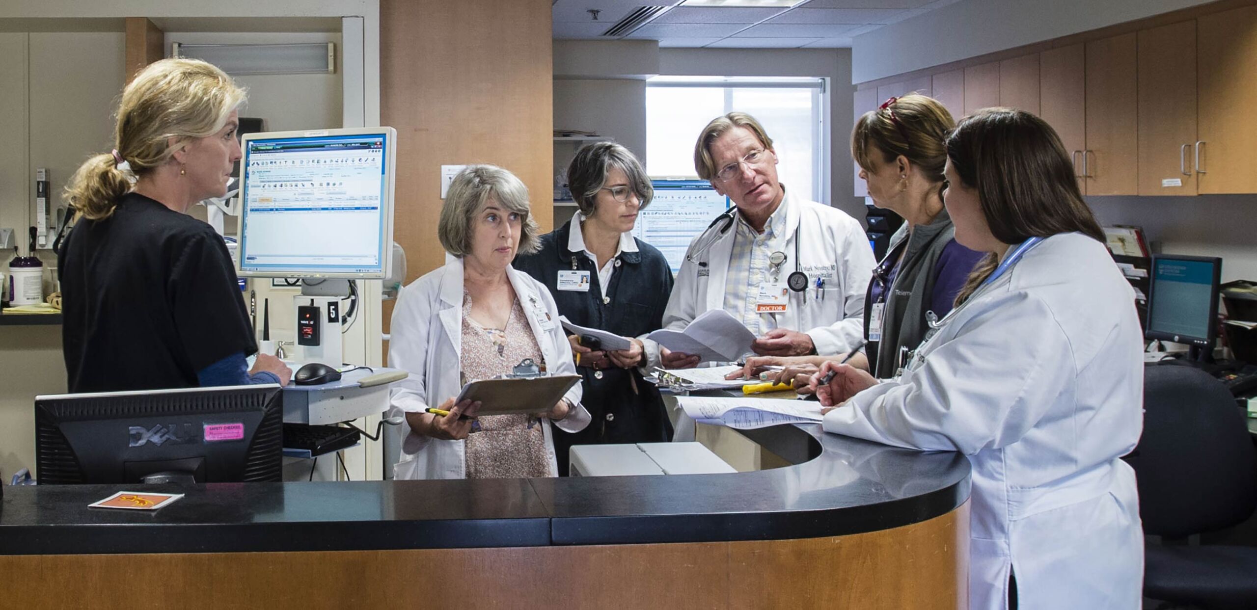 Hospitalist Mark Novotny consults with care team at Cooley Dickinson Hospital, 30 Locust Street, Northampton, MA 01060.