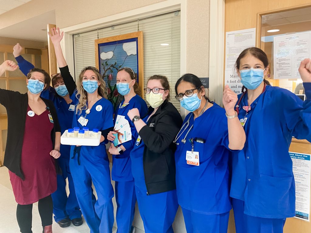 The first delivery of donor milk arrives at the Cooley Dickinson Childbirth Center. From left: Amy Walker, CNM (Certified Nurse Midwife); Karen Przybysewski, Childbirth Nurse Manager; Lisa Fitzgerald, Lactation Specialist; Stephanie Martin-Lucey, Nurse Practice Specialist; Laura Ernst, RN; Nasreen Azam, MD (Pediatric Hospitalist); Collette Vanderplas, RN.