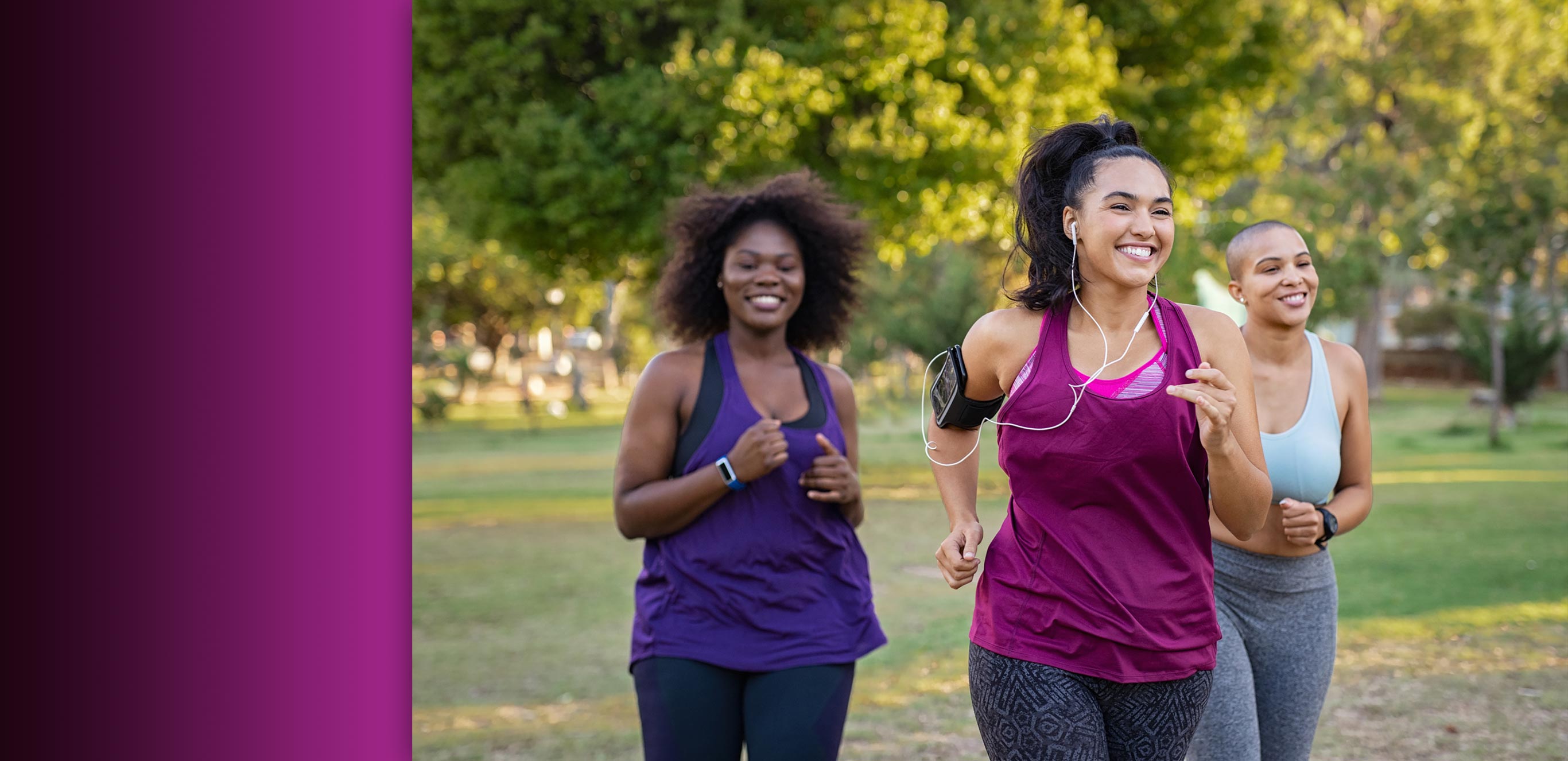 Three women running for exercise in a park