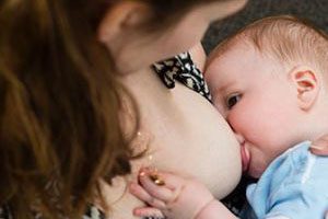 Woman breastfeeding a baby