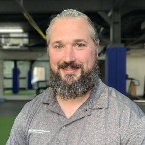 Jared Bean standing in the Wellness and Sports Performance Center gym