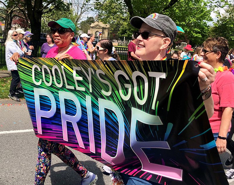 Cooley Dickinson Hospital president and chief operating officer Dr. Lynnette Watkins marching with Cooley staff in a recent Pride Parade.