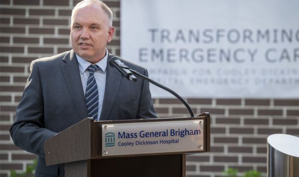 CDH President and Chief Executive Officer Kevin Whitney, DNP, RN, address the community at a podium.
