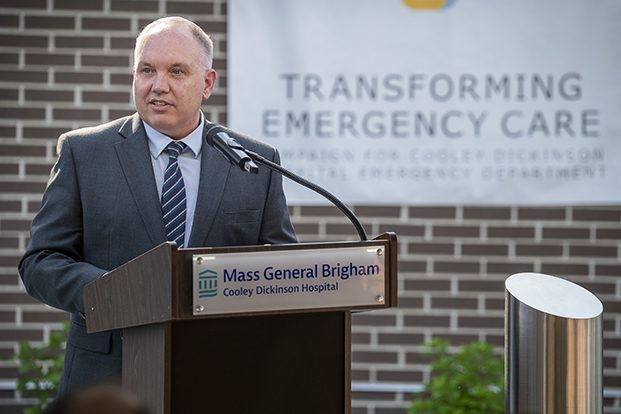 CDH President and Chief Executive Officer Kevin Whitney, DNP, RN, address the community at a podium.